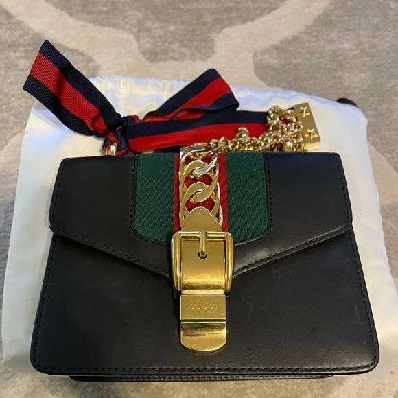 Gucci Handbags - Authentic Gucci Sylvia mini bag.